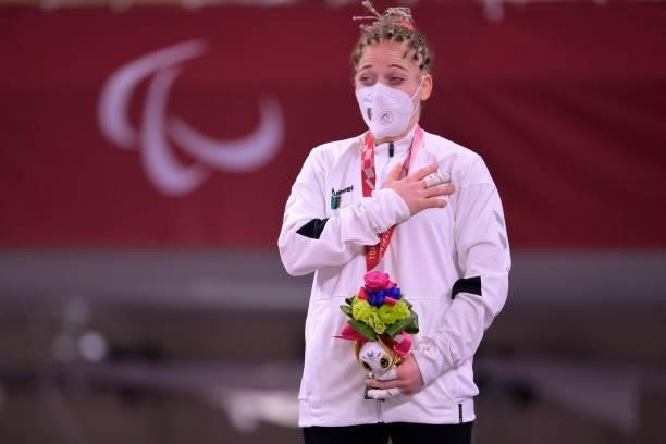 Gold medalist Cherine Abdellaoui of Team Algeria is seen on the podium at the medal ceremony for the Women's -52kg Judo on day 3 of the Tokyo 2020...
