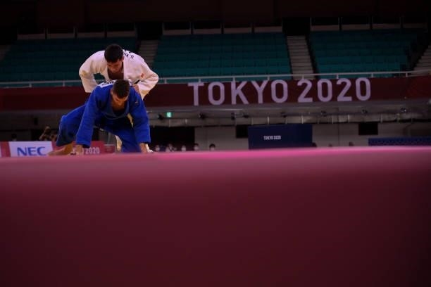 Uchkun Kuranbaev of Team Uzbekistan and Sergio Ibanez Banon of Team Spain compete in the Men's -66kg Judo on day 3 of the Tokyo 2020 Paralympic Games...