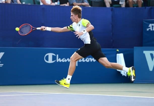 Ilya Ivashka of Belarus returns a shot to Emil Ruusuvuori of Finland during the semifinals of the Winston-Salem Open at Wake Forest Tennis Complex on...
