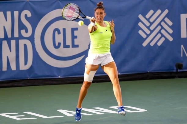 Sara Sorribes Tormo of Spain returns a serve during the first set of her semifinal match against Anett Kontaveit of Estonia on day 6 of the Cleveland...