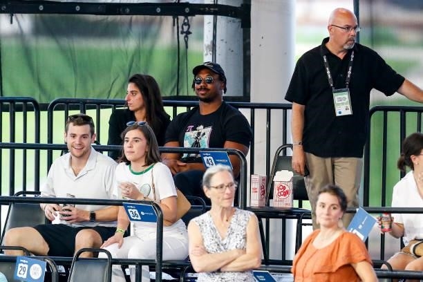 Cleveland Browns defensive end Myles Garrett watches Anett Kontaveit of Estonia and Sara Sorribes Tormo of Spain compete in their semifinal match on...