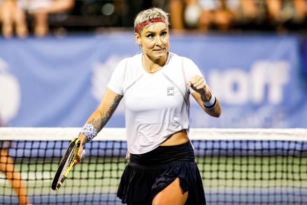 Bethanie Mattek-Sands of the United States celebrates during the second set of her semifinal doubles match against Ena Shibahara of Japan and Shuko...