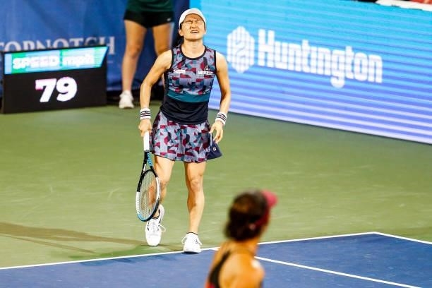 Shuko Aoyama of Japan reacts to hitting the ball out during the first set of her semifinal doubles match against Bethanie Mattek-Sands of the United...