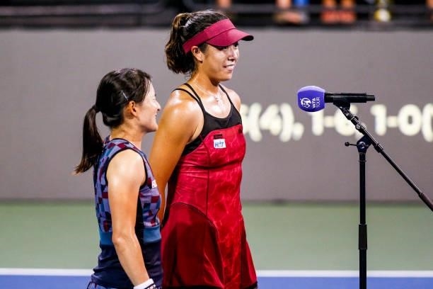 Ena Shibahara of Japan and Shuko Aoyama of Japan are interviewed after winning in the tie break of their semifinal doubles match against Bethanie...