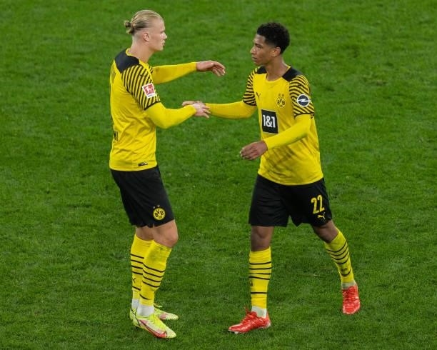 Erling Haarland of Borussia Dortmund shake hands with Jude Bellingham of Borussia Dortmund during the Bundesliga match between Borussia Dortmund and...