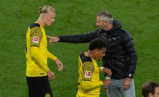 Head coach Marco Rose of Borussia Dortmund gives advices to Erling Haarland of Borussia Dortmund during the Bundesliga match between Borussia...