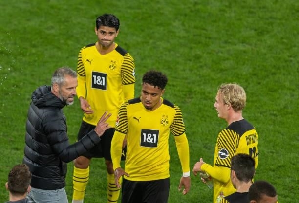 Head coach Marco Rose of Borussia Dortmund gives advices to Julian Brandt of Borussia Dortmund during the Bundesliga match between Borussia Dortmund...