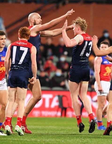Clayton Oliver of the Demons celebrates a goal with Max Gawn of the Demons during the AFL First Qualifying Final match between Melbourne Demons and...