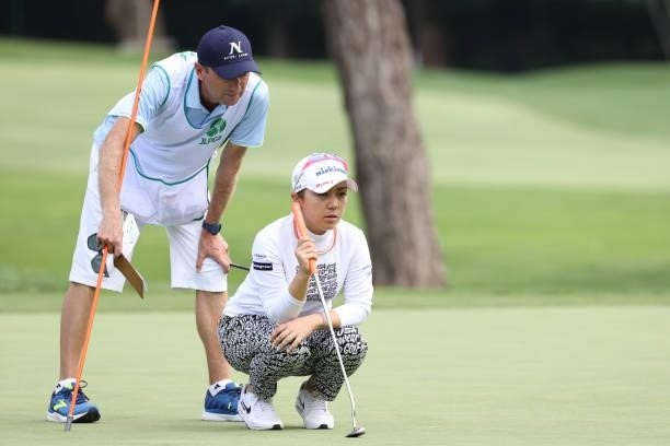 Mika Miyazato of Japan lines up her putt on the 6th hole during the third round of the Nitori Ladies at Otaru Country Club on August 28, 2021 in...