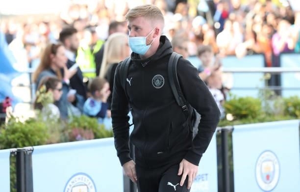 Tommy Doyle of Manchester City arrives at the stadium prior to the Premier League match between Manchester City and Arsenal at Etihad Stadium on...