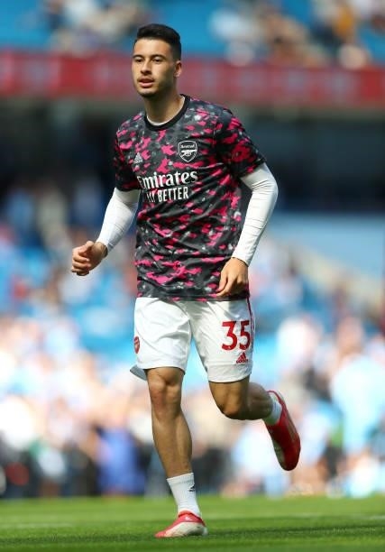 Gabriel Martinelli of Arsenal warms up ahead of the Premier League match between Manchester City and Arsenal at Etihad Stadium on August 28, 2021 in...