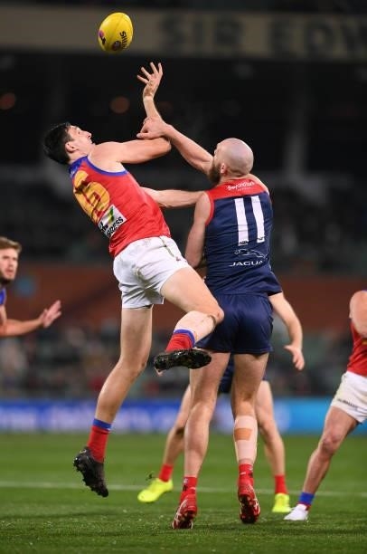 Oscar McInerney of the Lions rucks against Max Gawn of the Demons during the AFL First Qualifying Final match between Melbourne Demons and Brisbane...