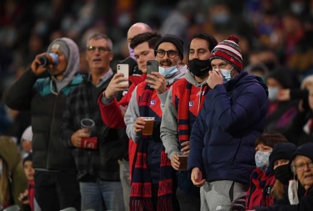 Melbourne fans during the AFL First Qualifying Final match between Melbourne Demons and Brisbane Lions at Adelaide Oval on August 28, 2021 in...