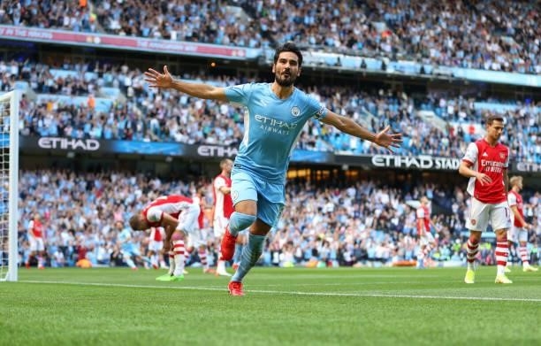 Ilkay Gundogan of Manchester City celebrates after scoring his team's first goal during the Premier League match between Manchester City and Arsenal...