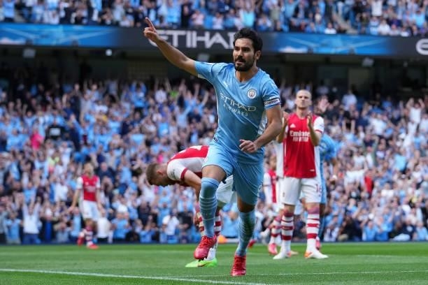 Ilkay Gundogan of Manchester City celebrates after scoring his team's first goal during the Premier League match between Manchester City and Arsenal...