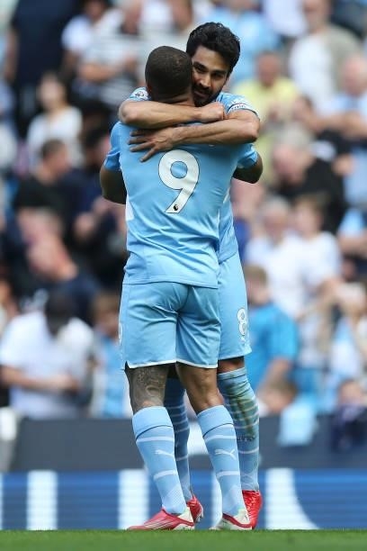 Ilkay Gundogan of Manchester City celebrates with teammate Gabriel Jesus after scoring his team's first goal during the Premier League match between...