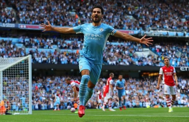 Ilkay Gundogan of Manchester City celebrates after scoring the opening goal during the Premier League match between Manchester City and Arsenal at...