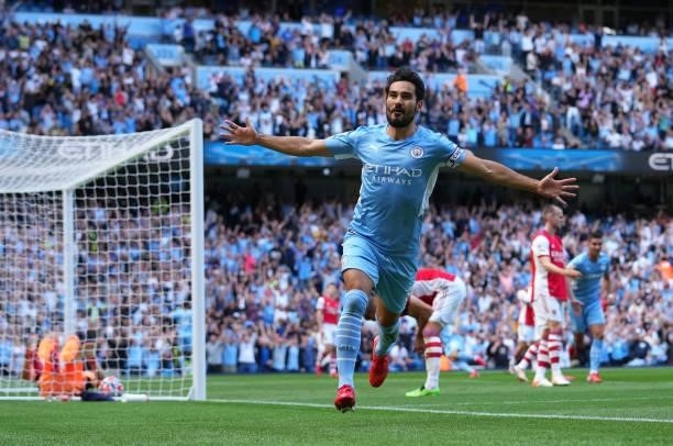 Ilkay Gundogan of Manchester City celebrates after scoring their sides first goal during the Premier League match between Manchester City and Arsenal...