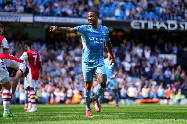 Gabriel Jesus of Manchester City celebrates after scoring their sides third goal during the Premier League match between Manchester City and Arsenal...