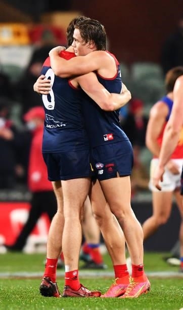 Jake Lever of the Demons and Trent Rivers of the Demons hug at the final siren during the AFL First Qualifying Final match between Melbourne Demons...