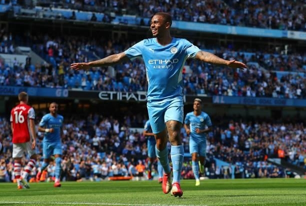 Gabriel Jesus of Manchester City celebrates after scoring their third goal during the Premier League match between Manchester City and Arsenal at...