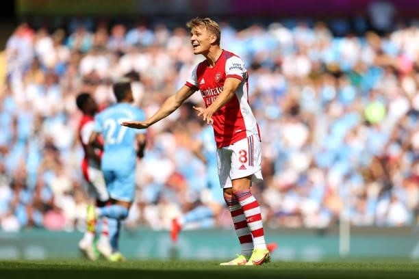 Martin Odegaard of Arsenal gives instructions to their side during the Premier League match between Manchester City and Arsenal at Etihad Stadium on...