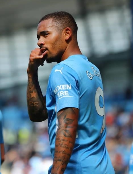 Gabriel Jesus of Manchester City celebrates after scoring their third goal during the Premier League match between Manchester City and Arsenal at...