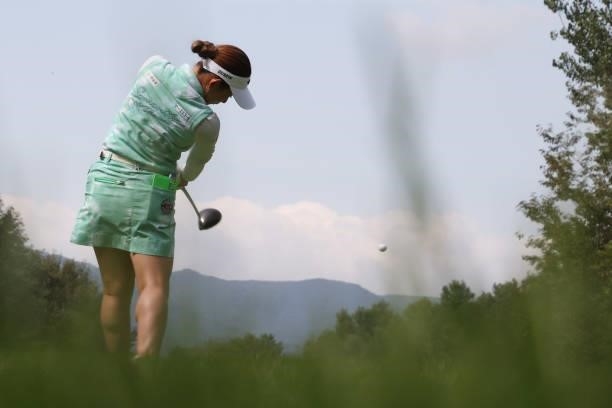 Hikaru Yoshimoto of Japan hits her tee shot on the 6th hole during the third round of the Nitori Ladies at Otaru Country Club on August 28, 2021 in...