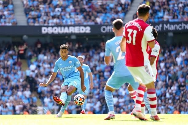 Rodrigo of Manchester City scores his team's fourth goal during the Premier League match between Manchester City and Arsenal at Etihad Stadium on...