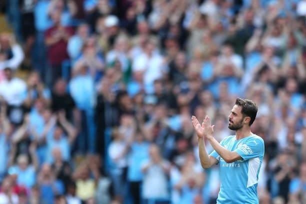 Bernardo Silva of Manchester City interacts with the crowd during the Premier League match between Manchester City and Arsenal at Etihad Stadium on...