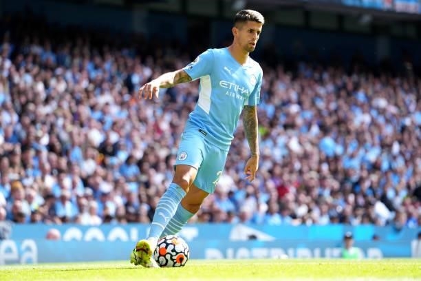 Joao Cancelo of Manchester City runs with the ball during the Premier League match between Manchester City and Arsenal at Etihad Stadium on August...