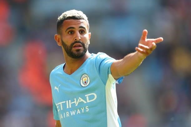 Riyad Mahrez of Manchester City gives instructions to their side during the Premier League match between Manchester City and Arsenal at Etihad...