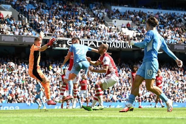 Ferran Torres of Manchester City scores their sides fifth goal past Bernd Leno of Arsenal during the Premier League match between Manchester City and...