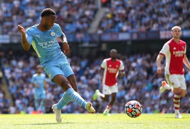 Raheem Sterling of Manchester City has a shot on goal during the Premier League match between Manchester City and Arsenal at Etihad Stadium on August...