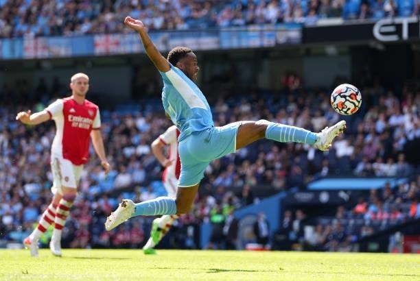 Raheem Sterling of Manchester City controls the ball during the Premier League match between Manchester City and Arsenal at Etihad Stadium on August...