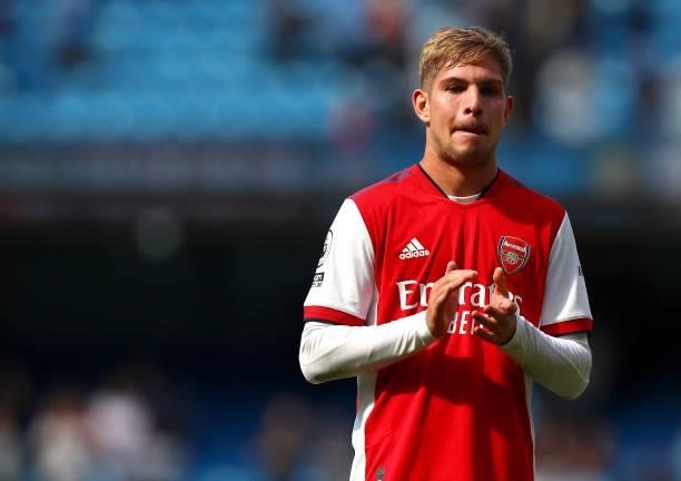 Emile Smith Rowe of Arsenal applauds the fans after the Premier League match between Manchester City and Arsenal at Etihad Stadium on August 28, 2021...