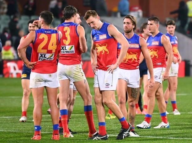 Dejected Brisbane players after losing the AFL First Qualifying Final match between Melbourne Demons and Brisbane Lions at Adelaide Oval on August...