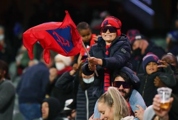 Young Melbourne fan during the AFL First Qualifying Final match between Melbourne Demons and Brisbane Lions at Adelaide Oval on August 28, 2021 in...