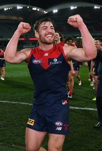 Michael Hibberd of the Demons celebfrates as he heads down the race after the AFL First Qualifying Final match between Melbourne Demons and Brisbane...