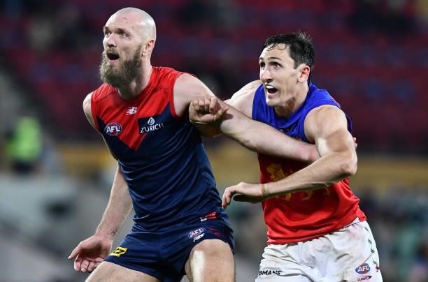 Max Gawn of the Demons rucks against Oscar McInerney of the Lions during the AFL First Qualifying Final match between Melbourne Demons and Brisbane...