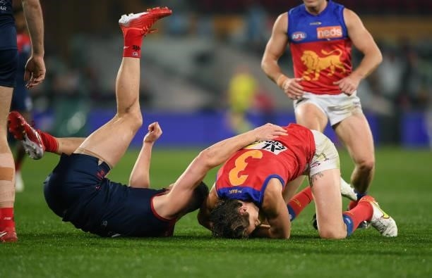 Joe Daniher of the Lions marks in front of Steven May of the Demons during the AFL First Qualifying Final match between Melbourne Demons and Brisbane...