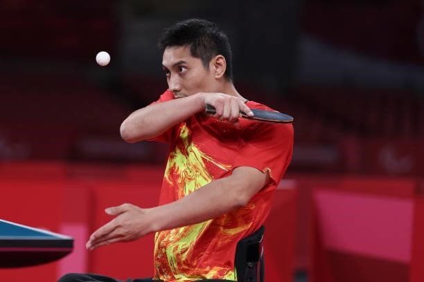 Panfeng Feng of Team China competes against Thomas Schmidberger of Team Germany during the Table Tennis Men's Singles Class 3 Gold Medal Match on day...