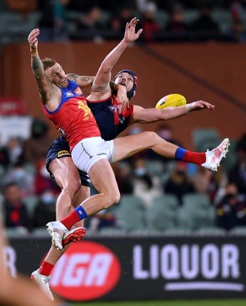 Angus Brayshaw of the Demons competes for the ball against Mitch Robinson of the Lions during the AFL First Qualifying Final match between Melbourne...