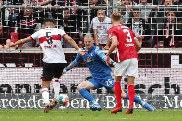 Konstantinos Mavropanos of VfB Stuttgart scores their sides first goal past Mark Flekken of Sport-Club Freiburg during the Bundesliga match between...