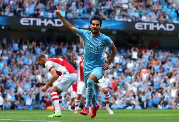 Ilkay Gundogan of Manchester City celebrates scoring his teams first goal during the Premier League match between Manchester City and Arsenal at...