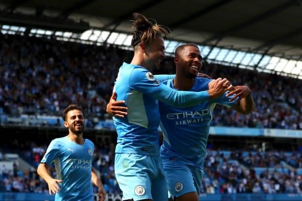 Gabriel Jesus of Manchester City celebrates scoring his teams third goal during the Premier League match between Manchester City and Arsenal at...