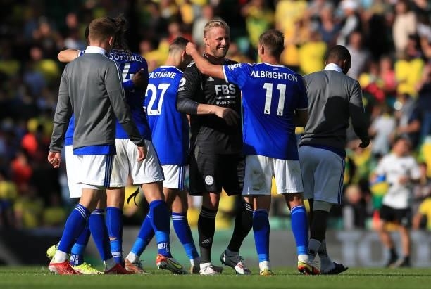 Kasper Schmeichel and Marc Albrighton of Leicester City interact following the Premier League match between Norwich City and Leicester City at Carrow...