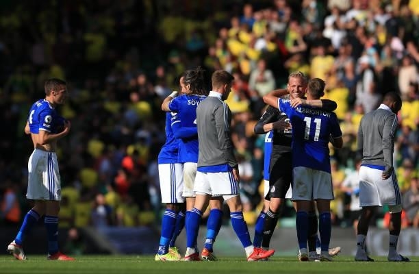 Kasper Schmeichel and Marc Albrighton of Leicester City interact following the Premier League match between Norwich City and Leicester City at Carrow...