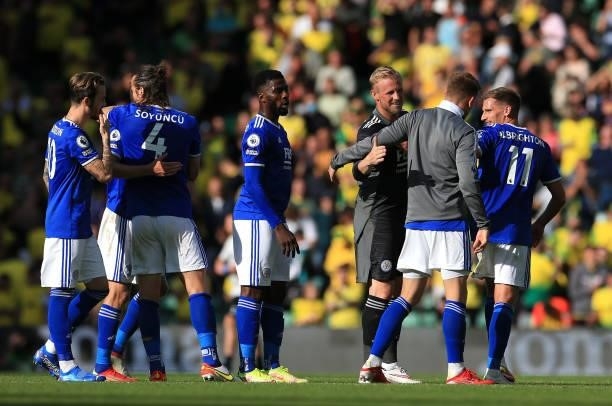 Players of Leicester City celebrate following the Premier League match between Norwich City and Leicester City at Carrow Road on August 28, 2021 in...