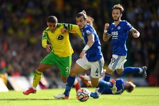 Max Aarons of Norwich City takes on Caglar Soyuncu of Leicester City during the Premier League match between Norwich City and Leicester City at...